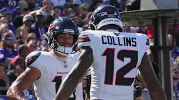 Oct 5, 2025; Baltimore, Maryland, USA; Houston Texans wide receiver Xavier Hutchinson (19) and wide receiver Nico Collins (12) celebrate a touchdown during the first quarter against the Baltimore Ravens at M&T Bank Stadium. Mandatory Credit: Mitch Stringer-Imagn Images
