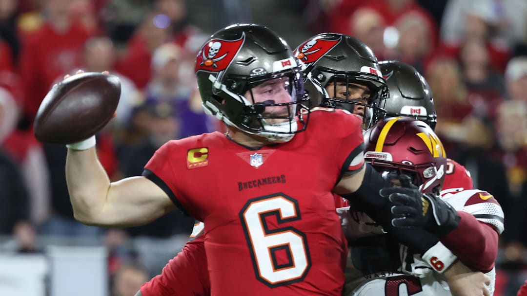Tampa Bay Buccaneers quarterback Baker Mayfield throws against Washington Commanders linebacker Dante Fowler Jr. Tampa Bay Buccaneers quarterback Baker Mayfield throws against Washington Commanders linebacker Dante Fowler Jr.