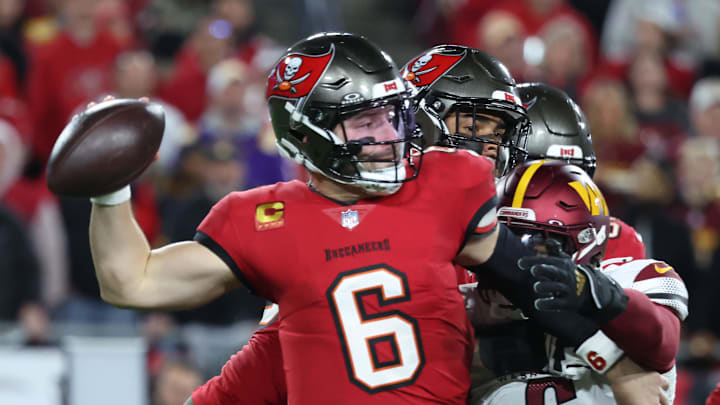 Tampa Bay Buccaneers quarterback Baker Mayfield throws against Washington Commanders linebacker Dante Fowler Jr. Tampa Bay Buccaneers quarterback Baker Mayfield throws against Washington Commanders linebacker Dante Fowler Jr.