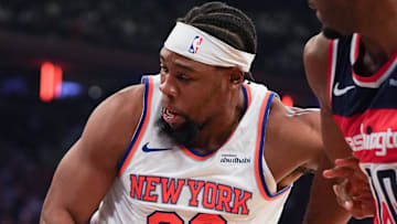 Nov 3, 2025; New York, New York, USA; New York Knicks forward Guerschon Yabusele (28) and Washington center Alex Sarr (20) battle for a rebound during the first half at Madison Square Garden. Mandatory Credit: Lucas Boland-Imagn Images