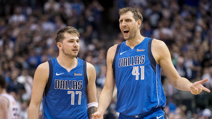 Dallas Mavericks forward Luka Doncic (77) and forward Dirk Nowitzki (41) come off the court during the game against the Phoenix Suns at the American Airlines Center. Mandatory Credit: Jerome Miron-Imagn Images Dallas Mavericks forward Luka Doncic (77) and forward Dirk Nowitzki (41) come off the court during the game against the Phoenix Suns at the American Airlines Center. Mandatory Credit: Jerome Miron-Imagn Images