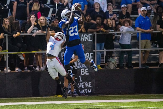 Jackson Christian's Jay'len Mosley (23) comes down with a catch vs. USJ on Sept. 8, 2023.