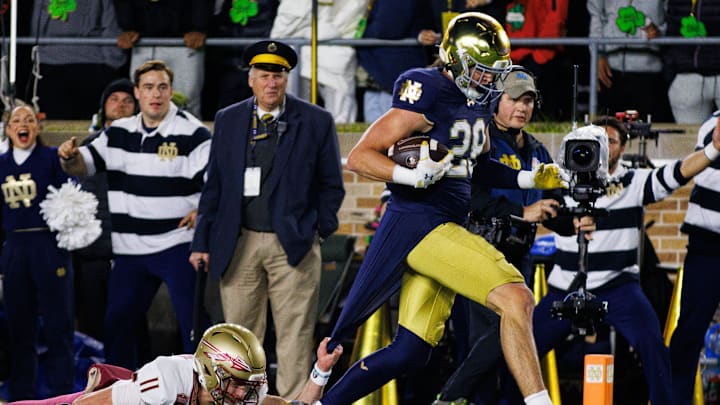 Notre Dame safety Luke Talich (28) runs into the end zone for a touchdown after intercepting a pass during a NCAA college football game against Florida State at Notre Dame Stadium on Saturday, Nov. 9, 2024, in South Bend.