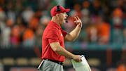 Oct 17, 2025; Miami Gardens, Florida, USA; Louisville Cardinals head coach Jeff Brohm reacts on the sideline against the Miami Hurricanes during the fourth quarter at Hard Rock Stadium. Mandatory Credit: Sam Navarro-Imagn Images