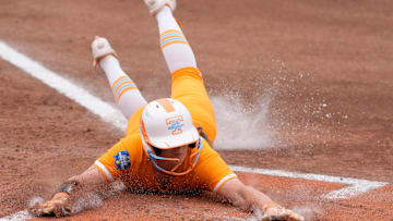 Tennessee outfielder Gabby Leach (55) sides home to score a run in the first inning of a Women's College World Series softball game between the Oklahoma Sooners (OU) and the Tennessee Volunteers at Devon Park in Oklahoma City, Thursday, May 29, 2025.