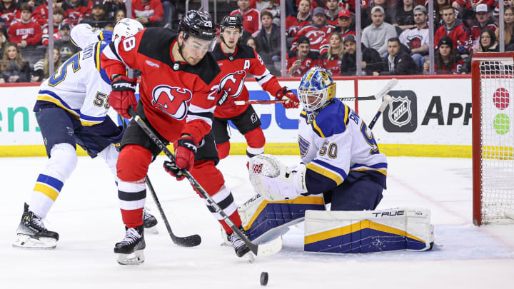Mar 7, 2024; Newark, New Jersey, USA; New Jersey Devils right wing Timo Meier (28) scores a goal past St. Louis Blues goaltender Jordan Binnington (50) during the first period at Prudential Center. Mandatory Credit: Vincent Carchietta-USA TODAY Sports
