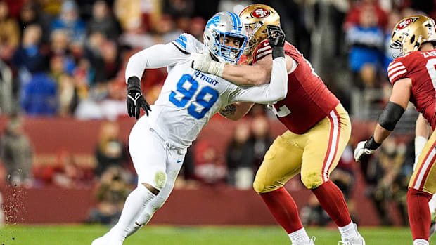 Detroit Lions defensive end Za'Darius Smith (99) pressures San Francisco 49ers offensive tackle Austen Pleasants (62).
