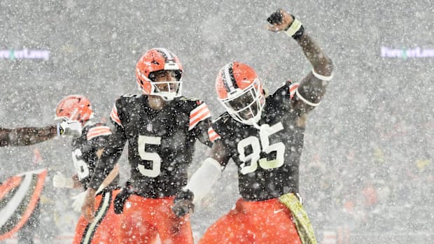 Jameis Winston, left, and tight end David Njoku celebrate a touchdown against the Steelers.