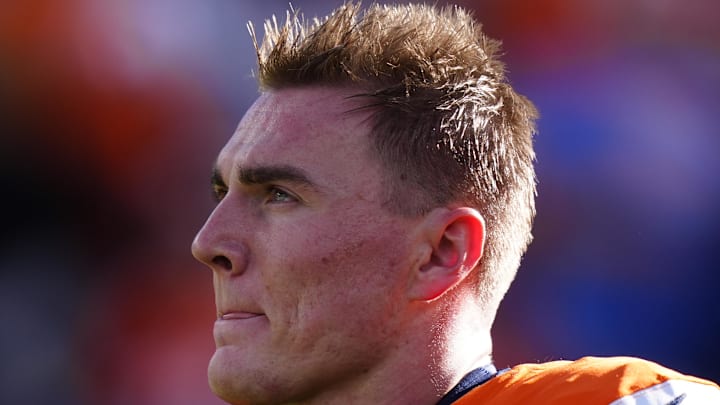 Dec 14, 2025; Denver, Colorado, USA; Denver Broncos quarterback Bo Nix (10) warms up before a game against the Green Bay Packers at Empower Field at Mile High. Mandatory Credit: Ron Chenoy-Imagn Images