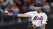 Sep 17, 2025; New York City, New York, USA; New York Mets second baseman Jeff McNeil (1) throws the ball to first base for an out during the sixth inning against the San Diego Padres at Citi Field. Mandatory Credit: Vincent Carchietta-Imagn Images