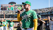Sep 26, 2024; Oakland, California, USA; Oakland Athletics manager Mark Kotsay (7) speaks to the crowd after the game against the Texas Rangers at Oakland-Alameda County Coliseum. Mandatory Credit: Ed Szczepanski-Imagn Images