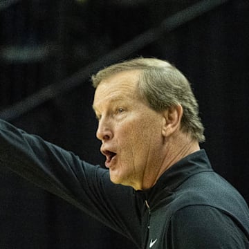 Oregon men's basketball coach Dana Altman calls to his team during an exhibition game against Utah at Matthew Knight Arena on Oct. 24, 2025.