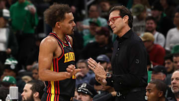 Trae Young #11 and head coach Quin Snyder of the Atlanta Hawks