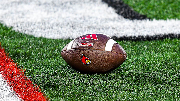 A football lies on the turf of L&N Stadium during Louisville's spring game.