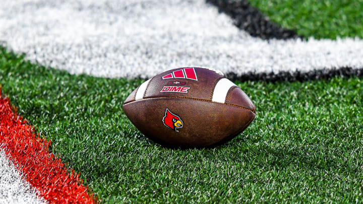 A football lies on the turf of L&N Stadium during Louisville's spring game.