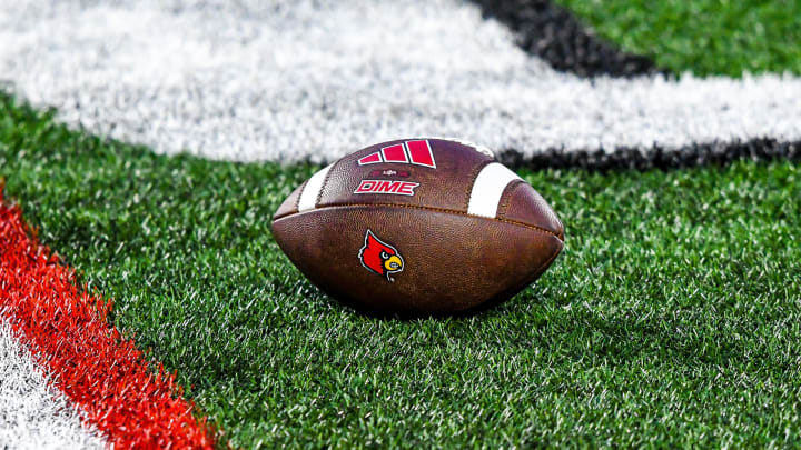 A football lies on the turf of L&N Stadium during Louisville's spring game.