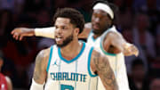 Mar 10, 2025; Miami, Florida, USA;  Charlotte Hornets guard Josh Green (10) reacts agsinst the during the second half at Kaseya Center. Mandatory Credit: Rhona Wise-Imagn Images