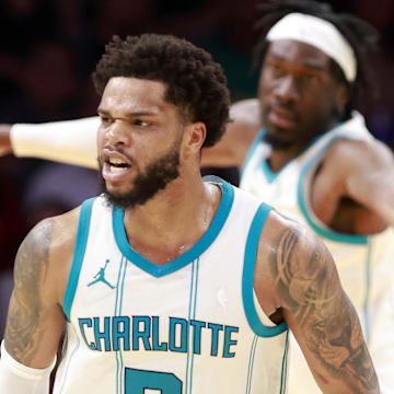 Mar 10, 2025; Miami, Florida, USA;  Charlotte Hornets guard Josh Green (10) reacts agsinst the during the second half at Kaseya Center. Mandatory Credit: Rhona Wise-Imagn Images