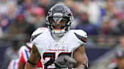 Oct 13, 2024; Foxborough, Massachusetts, USA; Houston Texans running back Joe Mixon (28) runs with the ball against the New England Patriots during the first half at Gillette Stadium. Mandatory Credit: Gregory Fisher-Imagn Images