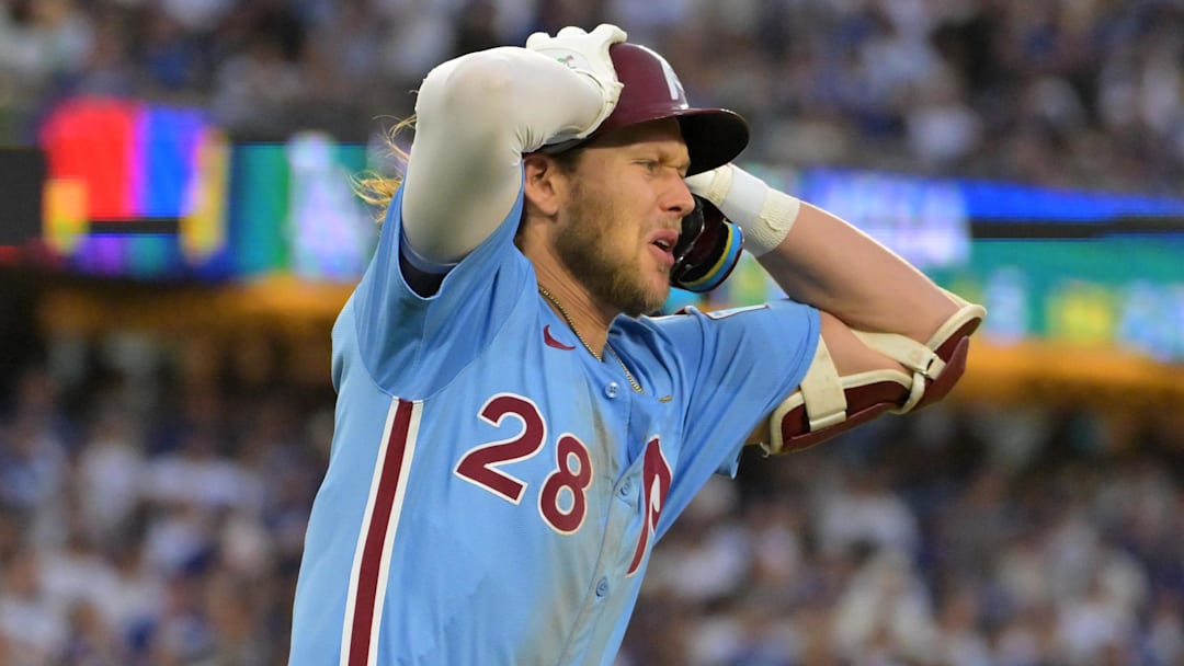 Philadelphia Phillies third baseman Alec Bohm (28) reacts after a long fly ball in the eleventh inning against the Los Angeles Dodgers during game four of the NLDS round for the 2025 MLB playoffs at Dodger Stadium. 