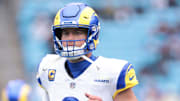 Nov 30, 2025; Charlotte, North Carolina, USA; Los Angeles Rams quarterback Matthew Stafford (9) warms up before the game against the Carolina Panthers at Bank of America Stadium. Mandatory Credit: Scott Kinser-Imagn Images