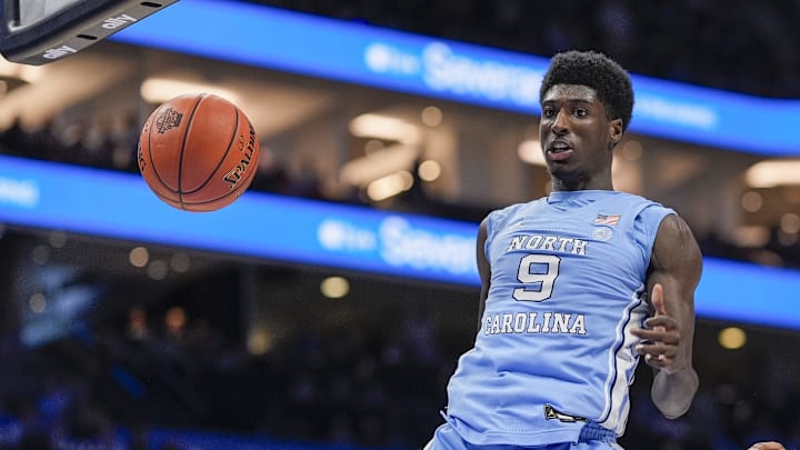 Mar 14, 2025; Charlotte, NC, USA; North Carolina Tar Heels guard Drake Powell (9) with a dunk against the Duke Blue Devils during the first half at Spectrum Center. Mandatory Credit: Jim Dedmon-Imagn Images Mar 14, 2025; Charlotte, NC, USA; North Carolina Tar Heels guard Drake Powell (9) with a dunk against the Duke Blue Devils during the first half at Spectrum Center. Mandatory Credit: Jim Dedmon-Imagn Images