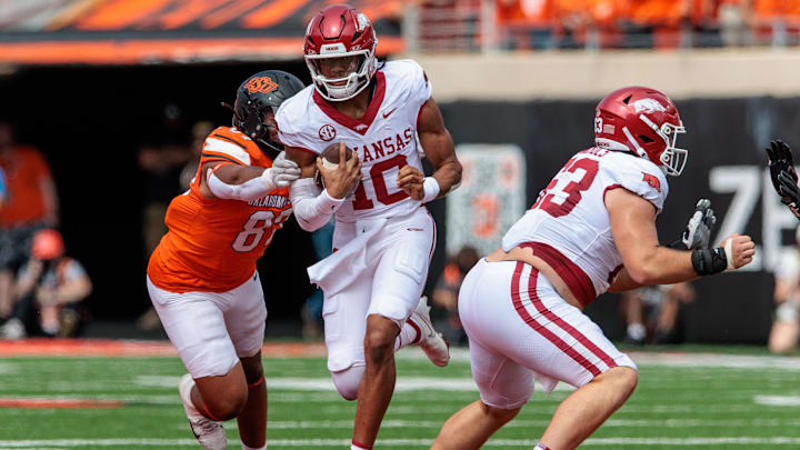 Sep 7, 2024; Stillwater, Oklahoma, USA; Arkansas Razorbacks quarterback Taylen Green (10) runs the ball during the first quarter against the Oklahoma State Cowboys at Boone Pickens Stadium. Mandatory Credit: William Purnell-Imagn Images