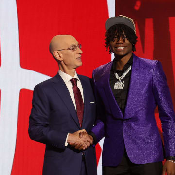 Jun 26, 2024; Brooklyn, NY, USA; Ja'Kobe Walter poses for photos with NBA commissioner Adam Silver after being selected in the first round by the Toronto Raptors in the 2024 NBA Draft at Barclays Center. Mandatory Credit: Brad Penner-USA TODAY Sports