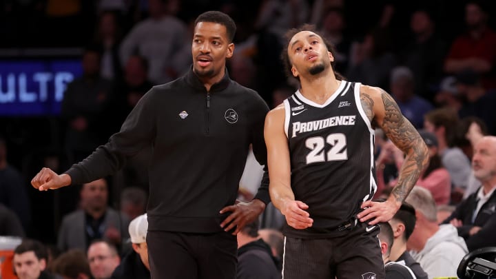 Mar 15, 2024; New York City, NY, USA; Providence Friars head coach Kim English coaches against the Marquette Golden Eagles while guard Devin Carter (22) reacts during the second half at Madison Square Garden. Mandatory Credit: Brad Penner-USA TODAY Sports