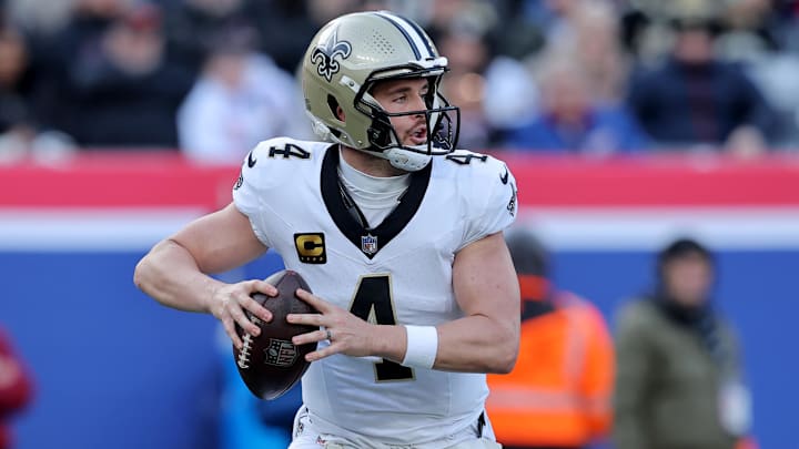 Dec 8, 2024; East Rutherford, New Jersey, USA; New Orleans Saints quarterback Derek Carr (4) drops back to pass against the New York Giants during the first quarter at MetLife Stadium. Mandatory Credit: Brad Penner-Imagn Images Dec 8, 2024; East Rutherford, New Jersey, USA; New Orleans Saints quarterback Derek Carr (4) drops back to pass against the New York Giants during the first quarter at MetLife Stadium. Mandatory Credit: Brad Penner-Imagn Images