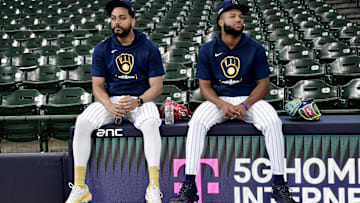 Oct 2, 2024; Milwaukee, Wisconsin, USA; Milwaukee Brewers pitcher Joel Payamps (31), left and outfielder Jackson Chourio (11) before game two of the Wildcard round for the 2024 MLB Playoffs against the New York Mets at American Family Field. Mandatory Credit: Benny Sieu-Imagn Images