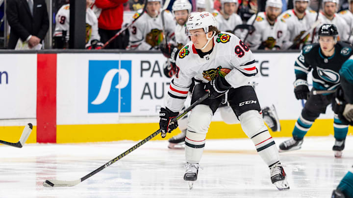 Mar 13, 2025; San Jose, California, USA;  Chicago Blackhawks center Connor Bedard (98) skates with the puck during the first period against the San Jose Sharks at SAP Center at San Jose. Mandatory Credit: Bob Kupbens-Imagn Images