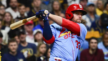 Sep 13, 2025; Milwaukee, Wisconsin, USA; St. Louis Cardinals second baseman Brendan Donovan (33) hits a solo home run against the Milwaukee Brewers in the third inning at American Family Field. Mandatory Credit: Benny Sieu-Imagn Images