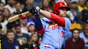 Sep 13, 2025; Milwaukee, Wisconsin, USA; St. Louis Cardinals second baseman Brendan Donovan (33) hits a solo home run against the Milwaukee Brewers in the third inning at American Family Field. Mandatory Credit: Benny Sieu-Imagn Images