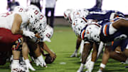 Sep 20, 2025; Charlottesville, Virginia, USA; The Stanford Cardinal offense lines up for an extra point conversion against the Virginia Cavaliers defense during the first quarter at Scott Stadium. Mandatory Credit: Geoff Burke-Imagn Images