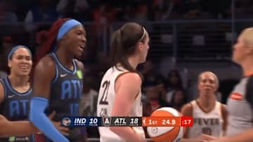 Indiana Fever guard Clark and Atlanta Dream guard Howard exchange words in the first quarter