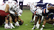 Sep 20, 2025; Charlottesville, Virginia, USA; The Stanford Cardinal offense lines up for an extra point conversion against the Virginia Cavaliers defense during the first quarter at Scott Stadium. Mandatory Credit: Geoff Burke-Imagn Images