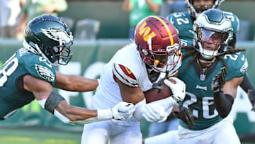Oct 1, 2023; Philadelphia, Pennsylvania, USA; Washington Commanders wide receiver Jahan Dotson (1) catches touchdown pass against Philadelphia Eagles cornerback Josh Jobe (28) and safety Terrell Edmunds (26) during the fourth quarter at Lincoln Financial Field. Mandatory Credit: Eric Hartline-USA TODAY Sports