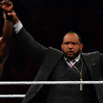 Apr 10, 2021; Tampa, Florida, USA; Bobby Lashley celebrates with MVP after defeating Drew McIntyre in their WWE Championship match during WrestleMania 37 at Raymond James Stadium. Mandatory Credit: Joe Camporeale-Imagn Images