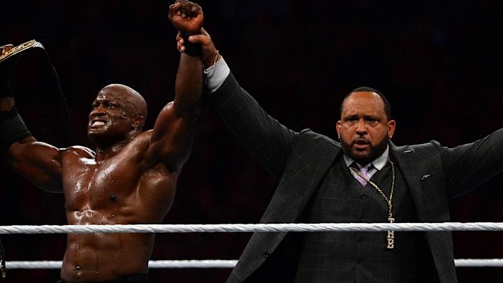 Apr 10, 2021; Tampa, Florida, USA; Bobby Lashley celebrates with MVP after defeating Drew McIntyre in their WWE Championship match during WrestleMania 37 at Raymond James Stadium. Mandatory Credit: Joe Camporeale-Imagn Images