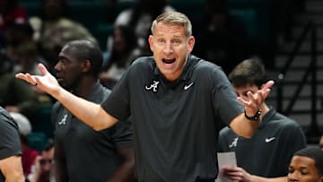 Nov 27, 2024; Las Vegas, Nevada, USA; Alabama Crimson Tide head coach Nate Oats protests a call in favor of the Rutgers Scarlet Knights during the first half at MGM Grand Garden Arena. Mandatory Credit: Stephen R. Sylvanie-Imagn Images