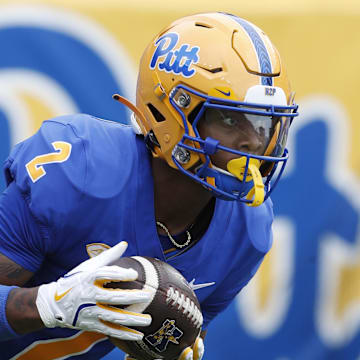 Aug 31, 2024; Pittsburgh, Pennsylvania, USA;  Pittsburgh Panthers wide receiver Kenny Johnson (2) returns a kick-off against the Kent State Golden Flashes during the first quarter at Acrisure Stadium. Mandatory Credit: Charles LeClaire-Imagn Images