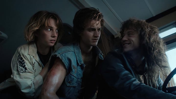 STRANGER THINGS. (L to R) Maya Hawke as Robin Buckley, Joe Keery as Steve Harrington and Joseph Quinn as Eddie Munson in STRANGER THINGS. Cr. Courtesy of Netflix © 2022