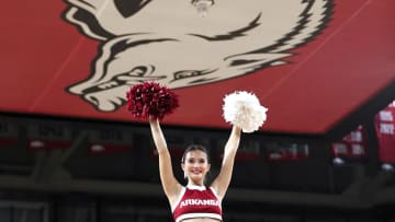 Jan 20, 2024; Fayetteville, Arkansas, USA; Arkansas Razorbacks cheerleader performs during the second half against the South Carolina Gamecocks at Bud Walton Arena. Gamecocks won 77-64. Mandatory Credit: Nelson Chenault-USA TODAY Sports