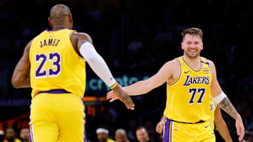 Lakers' LeBron James (left) and Luka Doncic (right) pictured versus Minnesota Timberwolves 