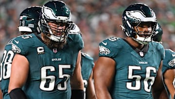 Philadelphia Eagles offensive tackle Lane Johnson (65) and guard Tyler Steen (56) against the Dallas Cowboys at Lincoln Financial Field.