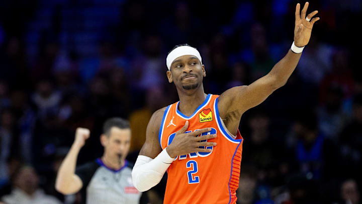 Jan 14, 2025; Philadelphia, Pennsylvania, USA; Oklahoma City Thunder guard Shai Gilgeous-Alexander (2) reacts after being fouled against the Philadelphia 76ers during the first quarter at Wells Fargo Center. Mandatory Credit: Bill Streicher-Imagn Images