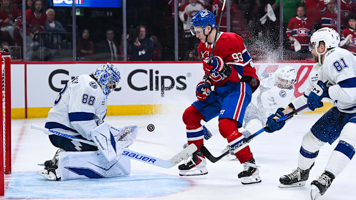 Apr 26, 2026; Montreal, Quebec, CAN; Tampa Bay Lightning goalie Andrei Vasilevskiy (88) makes a save against Montreal Canadiens right wing Ivan Demidov (93) during the third period in game four of the first round of the 2026 Stanley Cup Playoffs at Bell Centre. Mandatory Credit: David Kirouac-Imagn Images