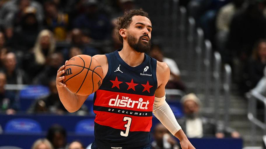 Washington Wizards guard Trae Young advances the ball against the Golden State Warriors.
