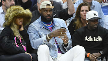 Savannah James, LeBron James, and Rich Paul during a game between the Cleveland Cavaliers and the Boston Celtics. 